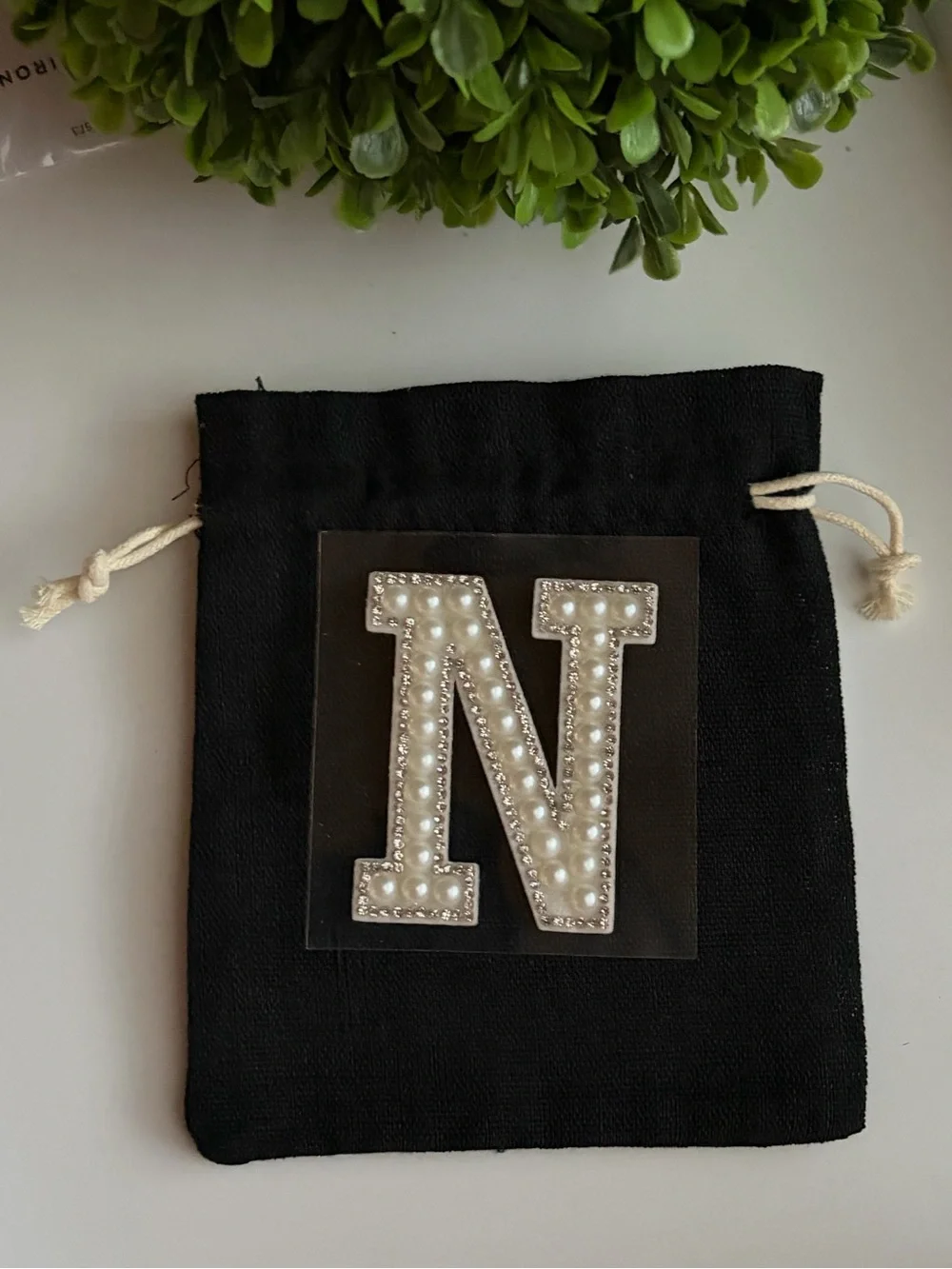 Black Drawstring Pouch with Pearl-Embellished Initial Accent - choose one